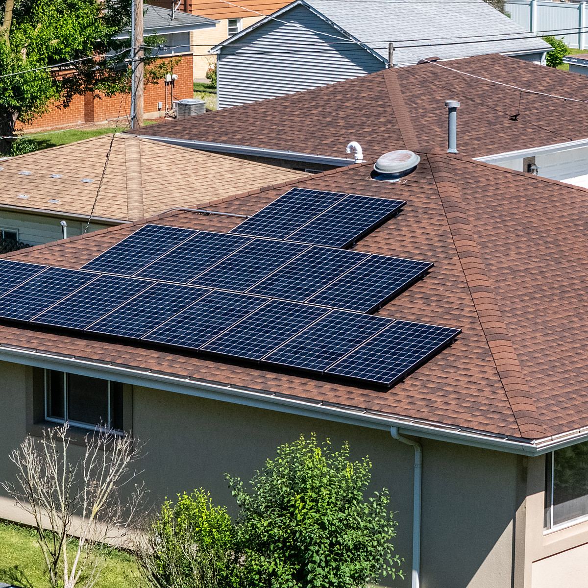 Rooftop solar array on a ranch home, seen from above