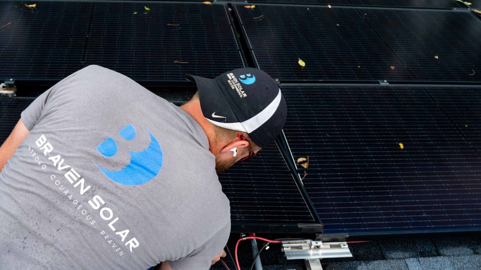 Braven Solar technician working on rooftop solar service