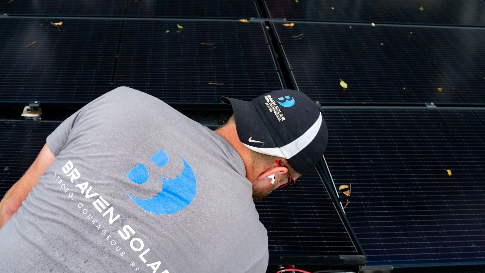 Braven Solar technician working on rooftop solar