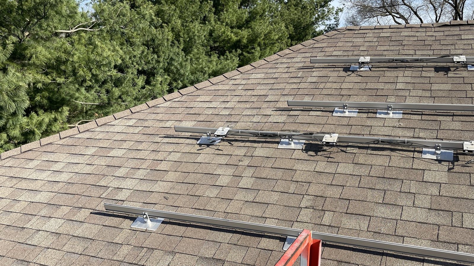 Rooftop racking and solar hardware work reviewed after roof or storm concerns