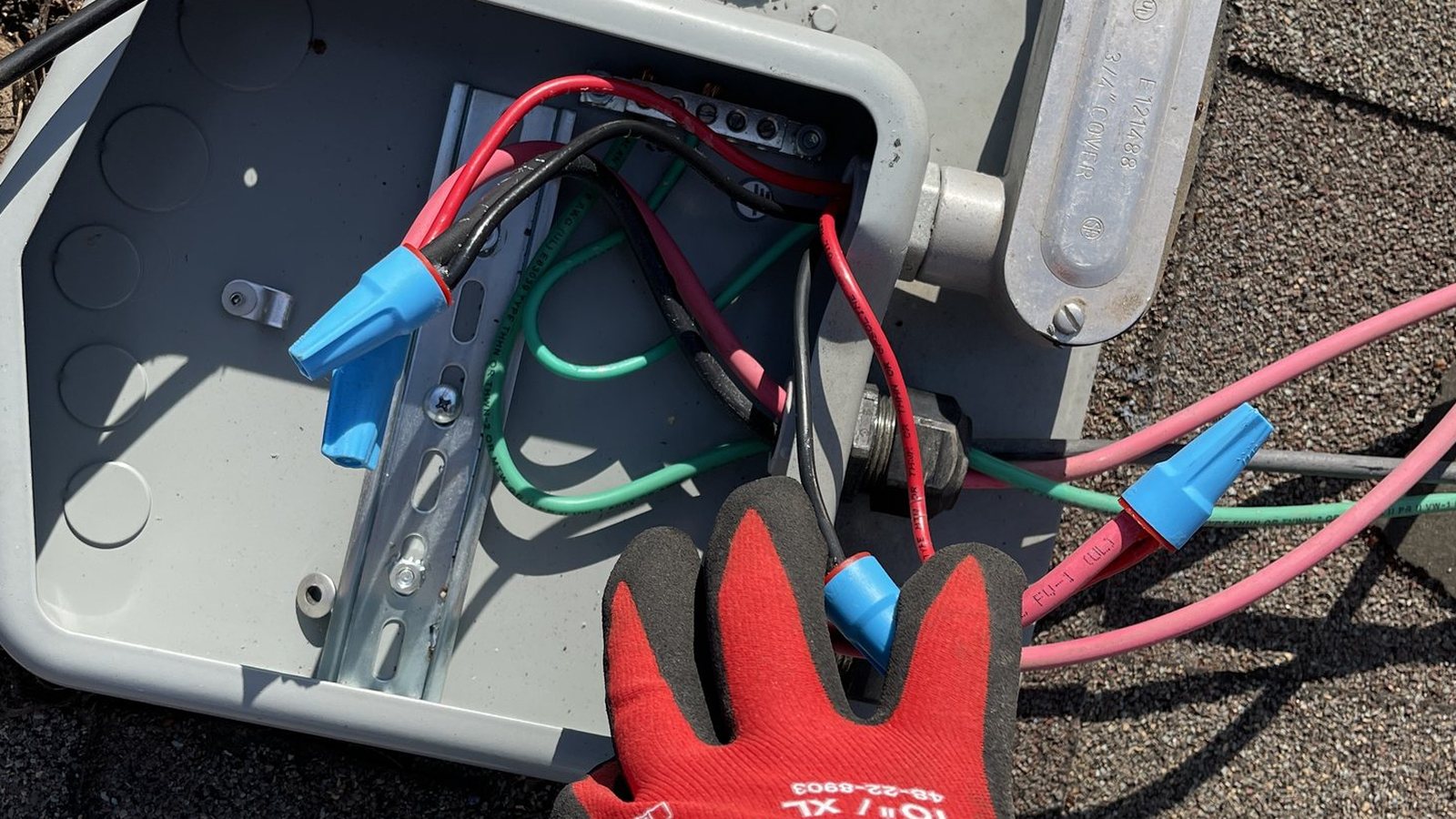 Hands-on wiring detail during solar service
