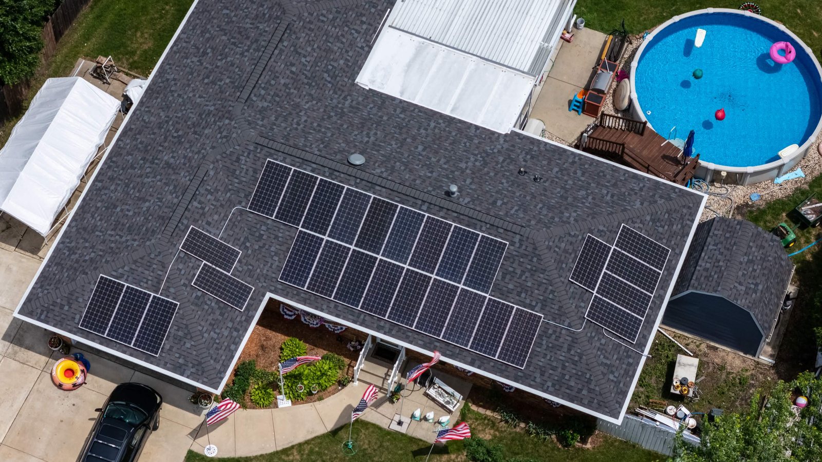 Aerial view of a completed residential rooftop solar project